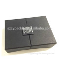 Black cardboard box for credit card with silver foil stamped logo
